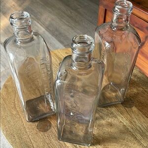 Set of Three Vintage Dodge Glass Bottles